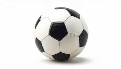 Fototapeta premium Classic black and white soccer ball with pentagon-hexagon pattern resting on white surface, casting soft shadow, isolated for sports visuals, global activity themes, or athletic branding.