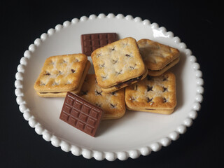 chocolate-coated crackers biscuits on a plate