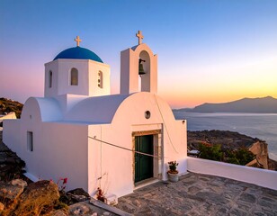 White church with blue dome at sunrise over the sea