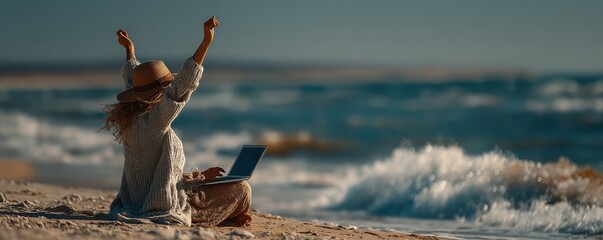 Woman working on a laptop while enjoying a peaceful beach atmosphere outdoors