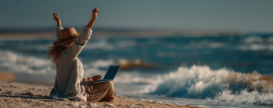 Woman working on a laptop while enjoying a peaceful beach atmosphere outdoors