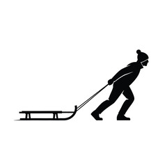 silhouette of a person pulling a sled