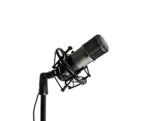 Professional microphone, angled, on stand against black background