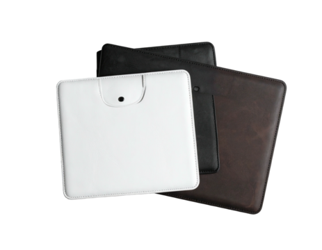 Three leather cases, white, black, and brown, stacked against a black background
