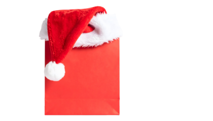 Red shopping bag with santa hat isolated on transparent background for christmas