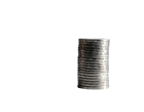 A stack of silver coins, illuminated, against a deep black background