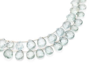 Moss Aquamarine Faceted Teardrop Gemstones on White
