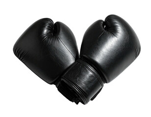 Two black leather boxing gloves intertwined, forming a heart shape, on black