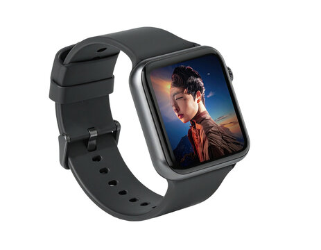 A smart watch, displaying a person with a scenic background, on a black band