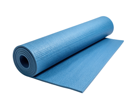 A blue exercise mat rolled out, partially, isolated on a black background