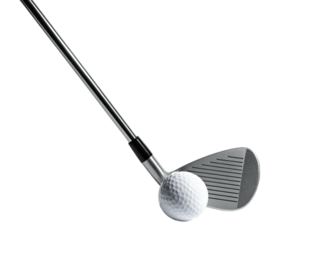Golf club poised to strike white golf ball, isolated against a black background