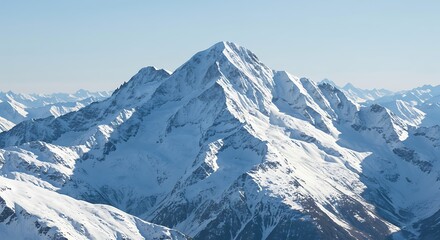 Obraz premium Snow covered mountain range with bright blue sky background and daylight