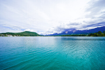 View of Lake Faak and the surrounding landscape in Carinthia. Nature by the lake in Austria.
