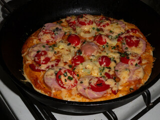 Homemade Skillet Pizza with Cheese and Sausage