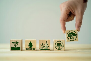 Hand places co2 icon cube promoting environmental protection and sustainable future concepts