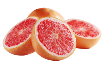 Three pink grapefruit halves, vibrant red flesh