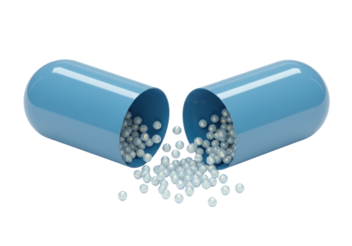 Isolated open blue capsule with small white balls spilling out, health supplement or drug