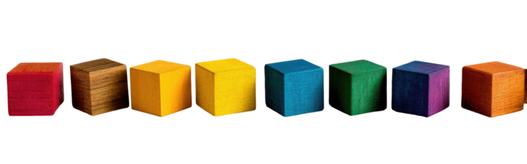 Row of colorful cube-shaped blocks in various hues of the rainbow spectrum against a black background
