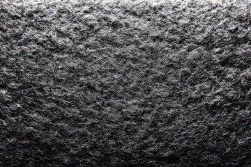 Fototapeta premium Textured dark gray stone surface