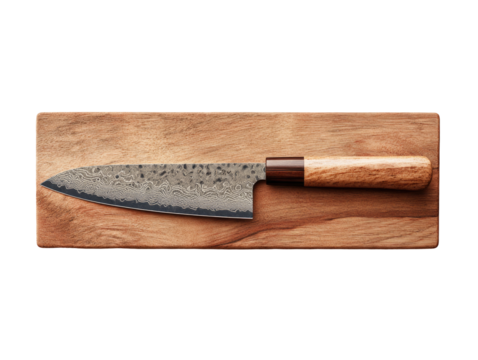 High-angle view of a chef's knife on a wooden board