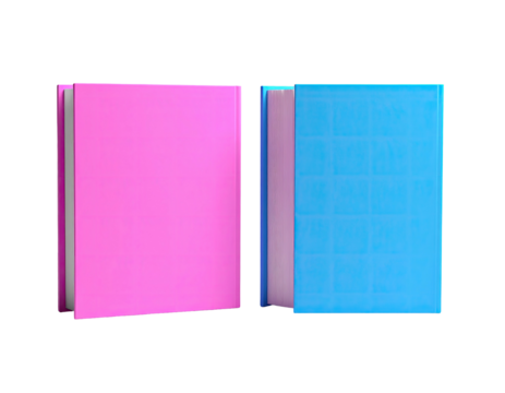 Two hardcover books, one pink, one blue, side-by-side, isolated on black