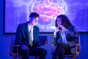 Seminar woman with man in conversation for ai governance, machine learning, Presenter promoting...