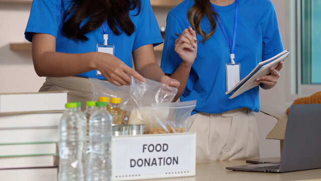 Volunteers Organizing Food Donations. Community members working together for a cause.