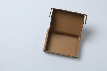 empty paper box with lid on white background, top view