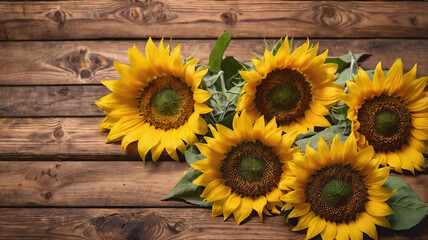 Sunflowers on wooden board.