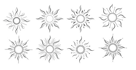 Set of decorative sunburst designs in black and white