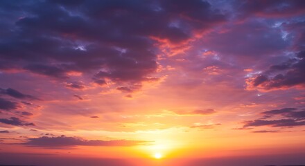 Vibrant sunset with colorful clouds and radiant sunlight in the sky