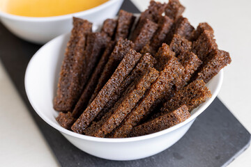 fried bread until crisp in oil with spices, delicious crispy rye bread croutons for cheese sauce