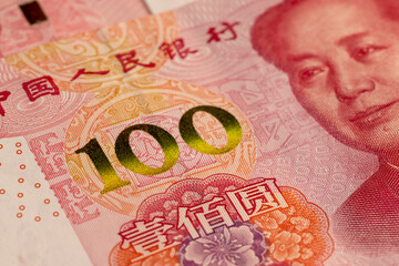 the obverse of a large number of genuine Chinese yuan money stacked on top of each other