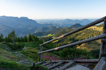 View from the Purtschellerhaus towards the Bavarian Alpine Foreland with alpine meadows and valley landscape
