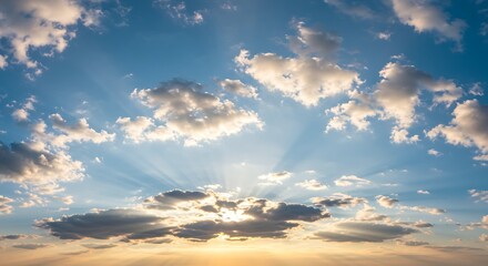 Obraz premium Vibrant blue sky with fluffy clouds and sunlight nature background