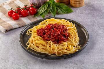 Italian pasta spaghetti bolognese with minced beef meat and tomato sauce