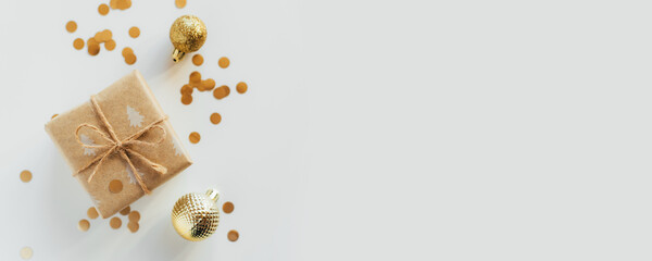 Christmas gift box and decorations on white background