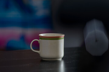 A cup of freshly brewed strong and black homemade coffee for a good mood