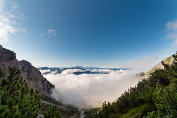Cloud Inversion Drifting Through Rugged