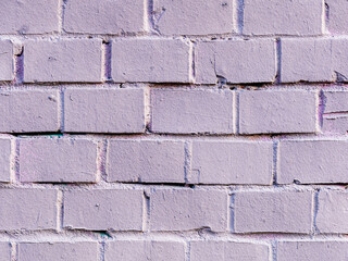 Painted brick wall. The texture of the brickwork. Vintage background with masonry.