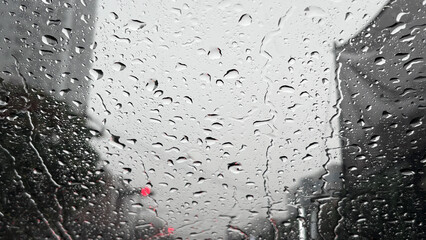 Raindrops on Car Windshield, Blurred Lights
