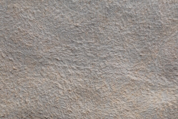 Light-colored suede material with texture
