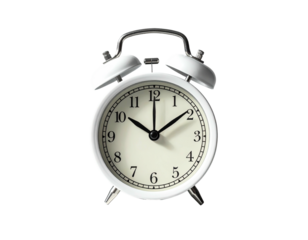White classic alarm clock with bells, on a black background, at 1010