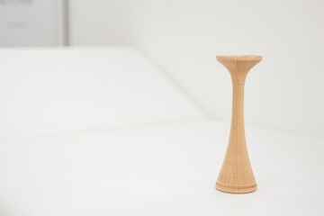 Pinard horn, fetal stethoscope, obstetrics. Wooden Pinard horn standing on a clean white background with ample copy space