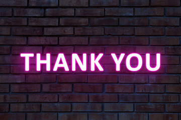 Obraz premium Thank you card design with glowing words on brick wall