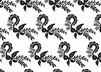 Repeating pattern of stylized floral and leaf elements in black against a white background, creating a decorative design.