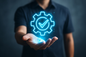 Futuristic holographic hand holding glowing gear with check mark symbolizing process quality assurance