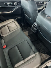 This detailed description highlights the back seats elegant and sophisticated design, along with the use of highquality materials, ensuring maximum comfort for passengers while traveling