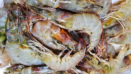 Fresh raw shrimp and prawns are a delicious, healthy seafood market meal