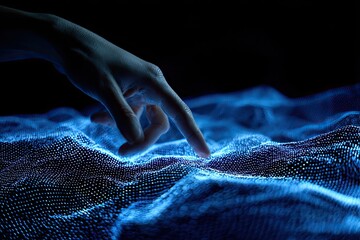 A hand delicately touches a glowing, undulating surface against a stark, black backdrop